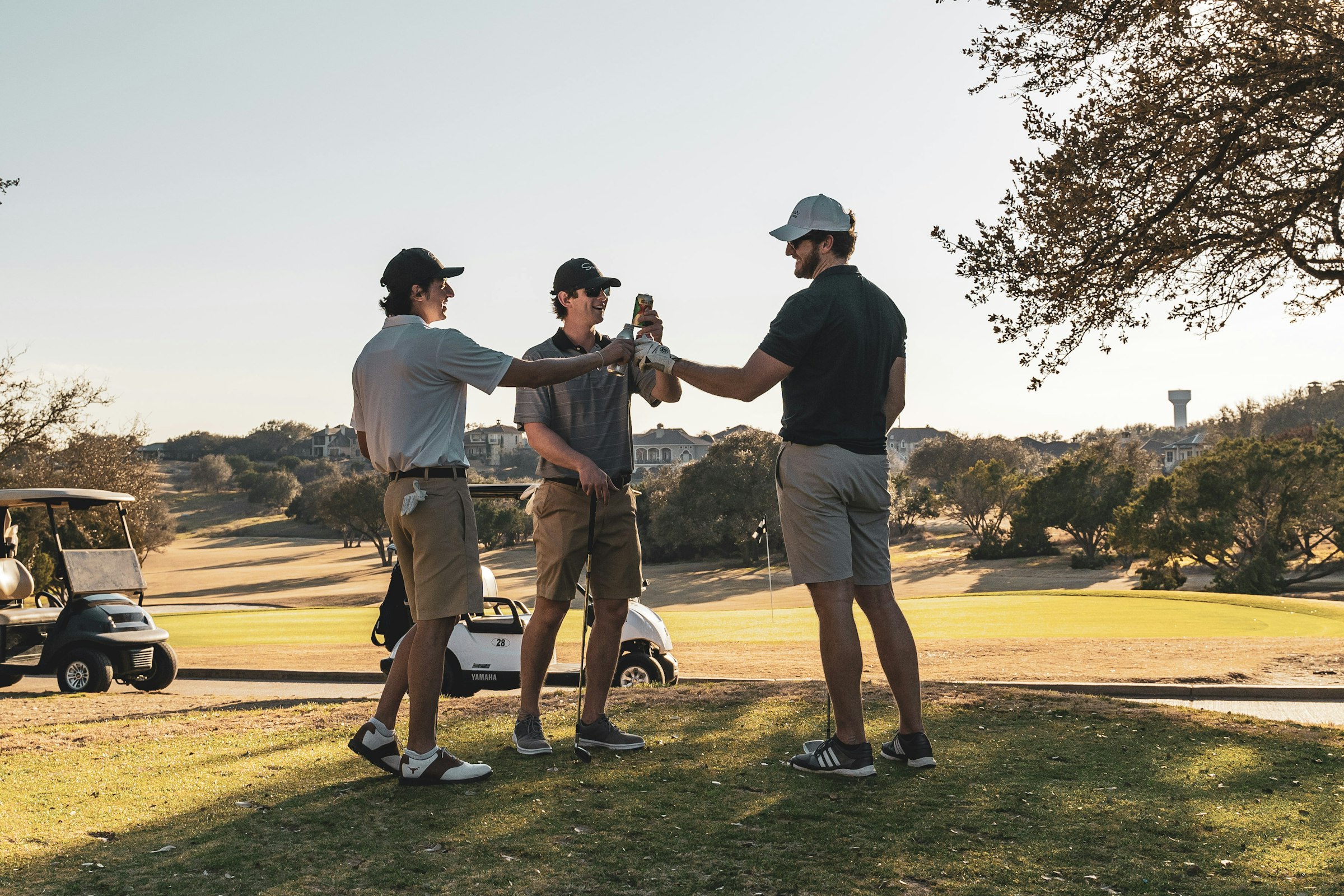 Golfer playing on a sunny fairway
